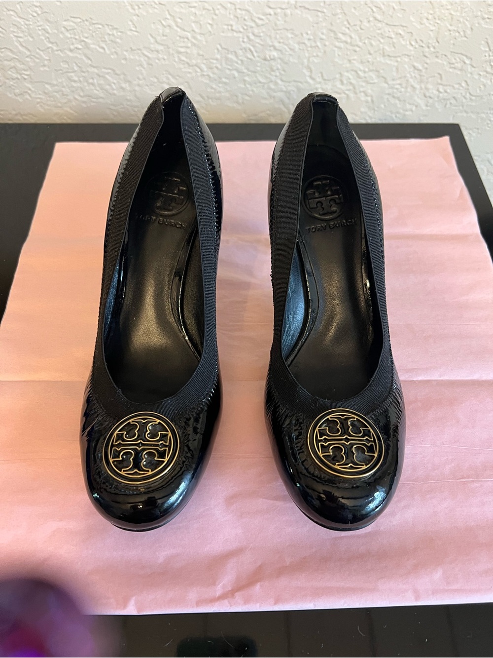 Tory Burch Black Patent Logo Round-Toe Pumps with Gold Emblem